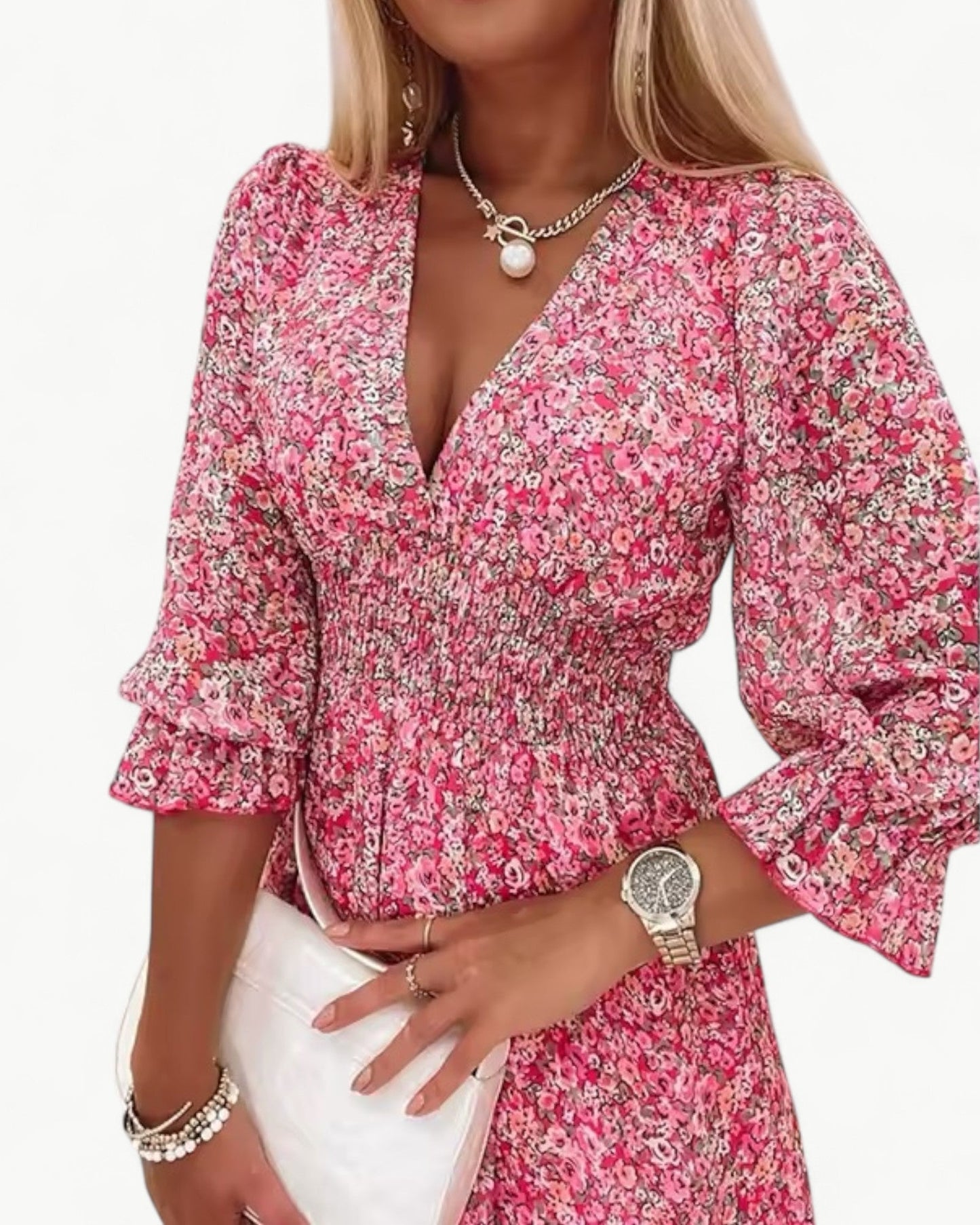 LÉONIE – Blommig klänning med smock & volangdetalj