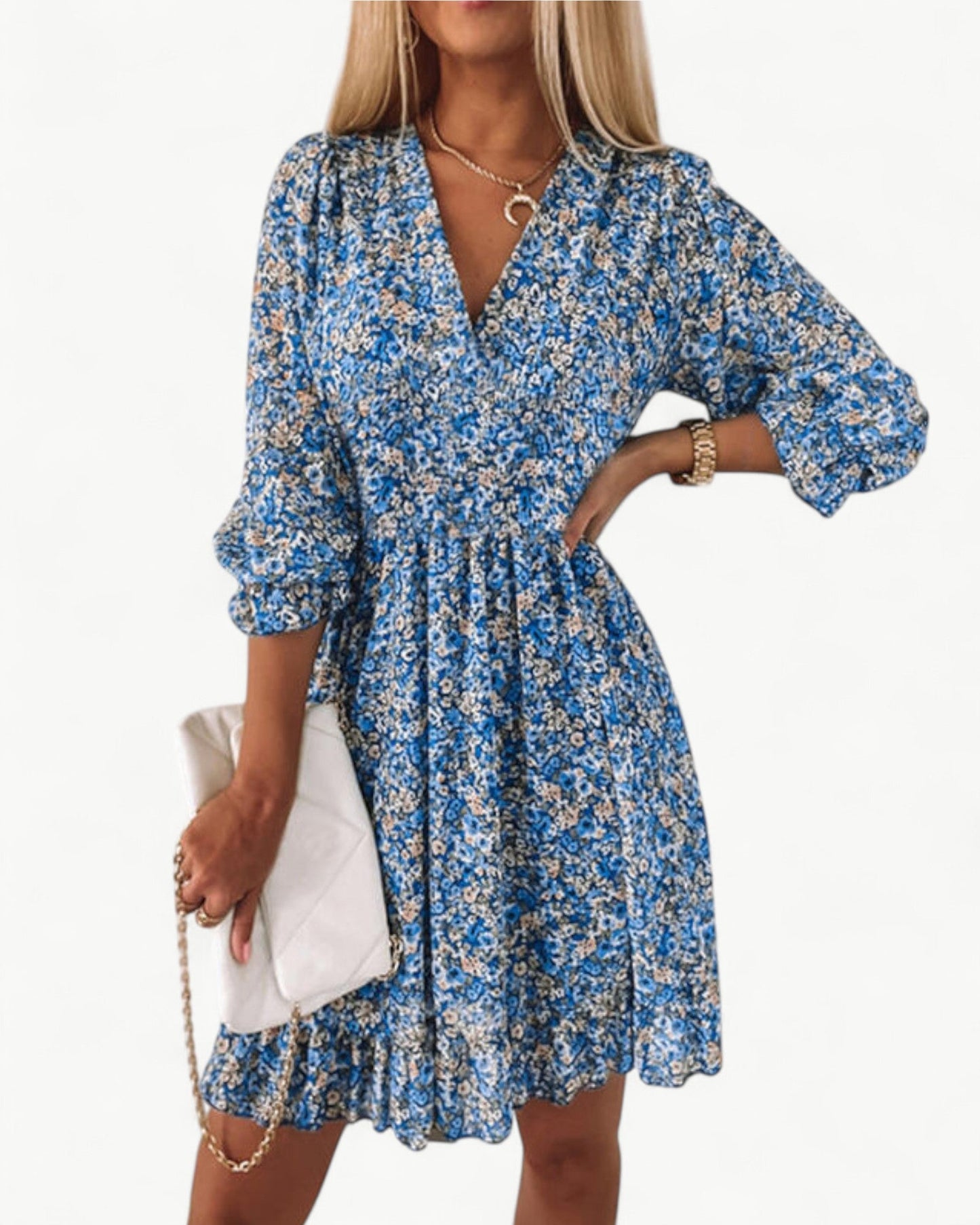 LÉONIE – Blommig klänning med smock & volangdetalj