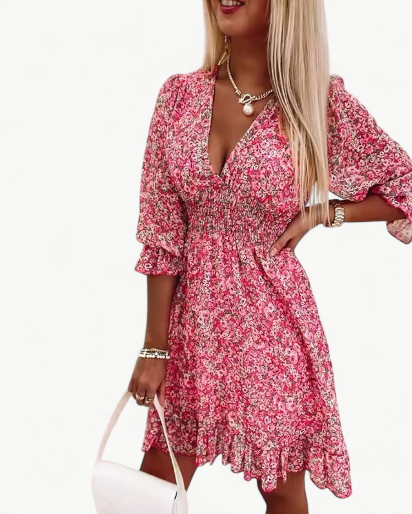 LÉONIE – Blommig klänning med smock & volangdetalj